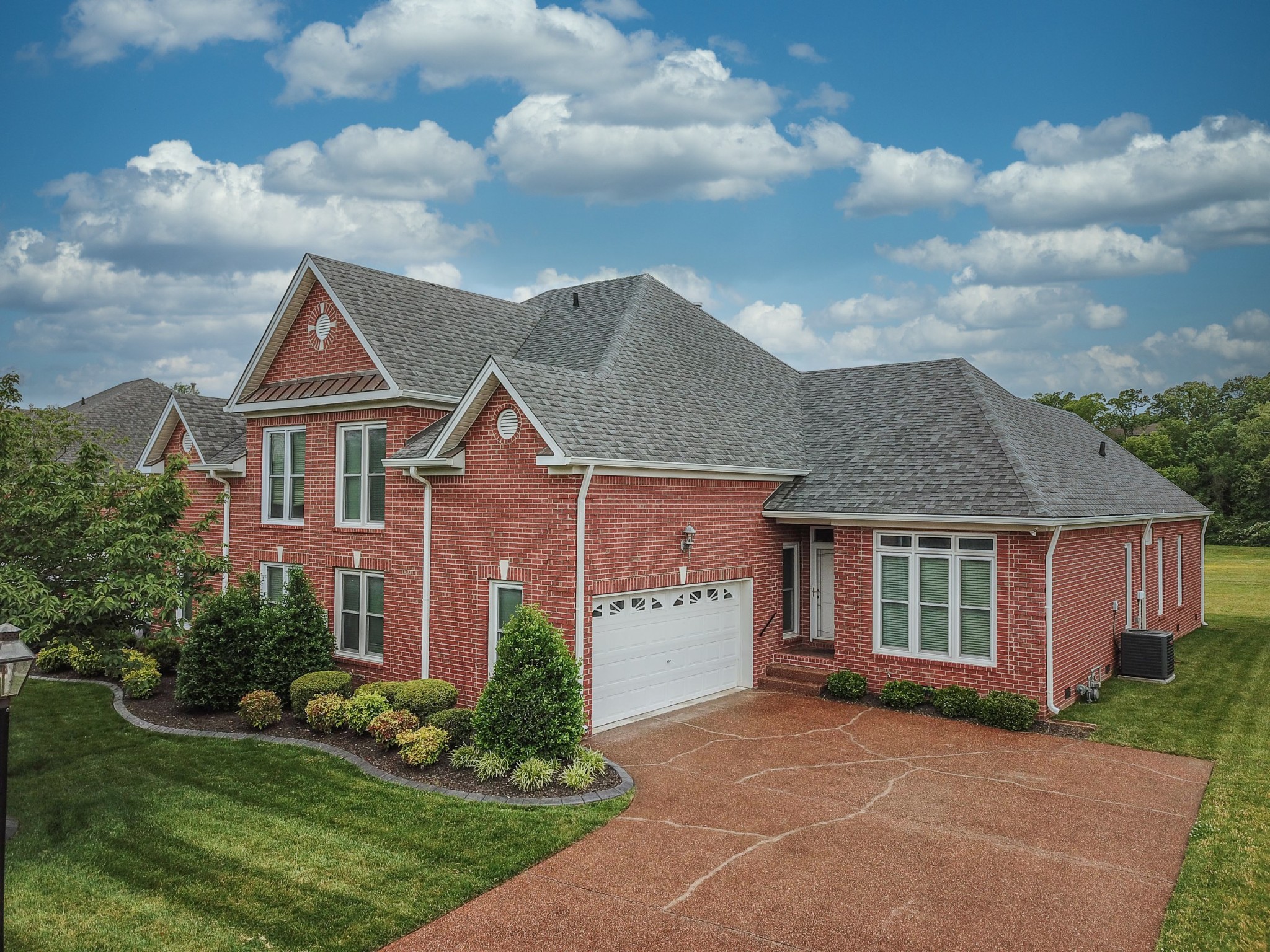 157 Stoners Glen Road Hermitage, TN 37076 - Photo 1 of 24 a front view of a house with garden