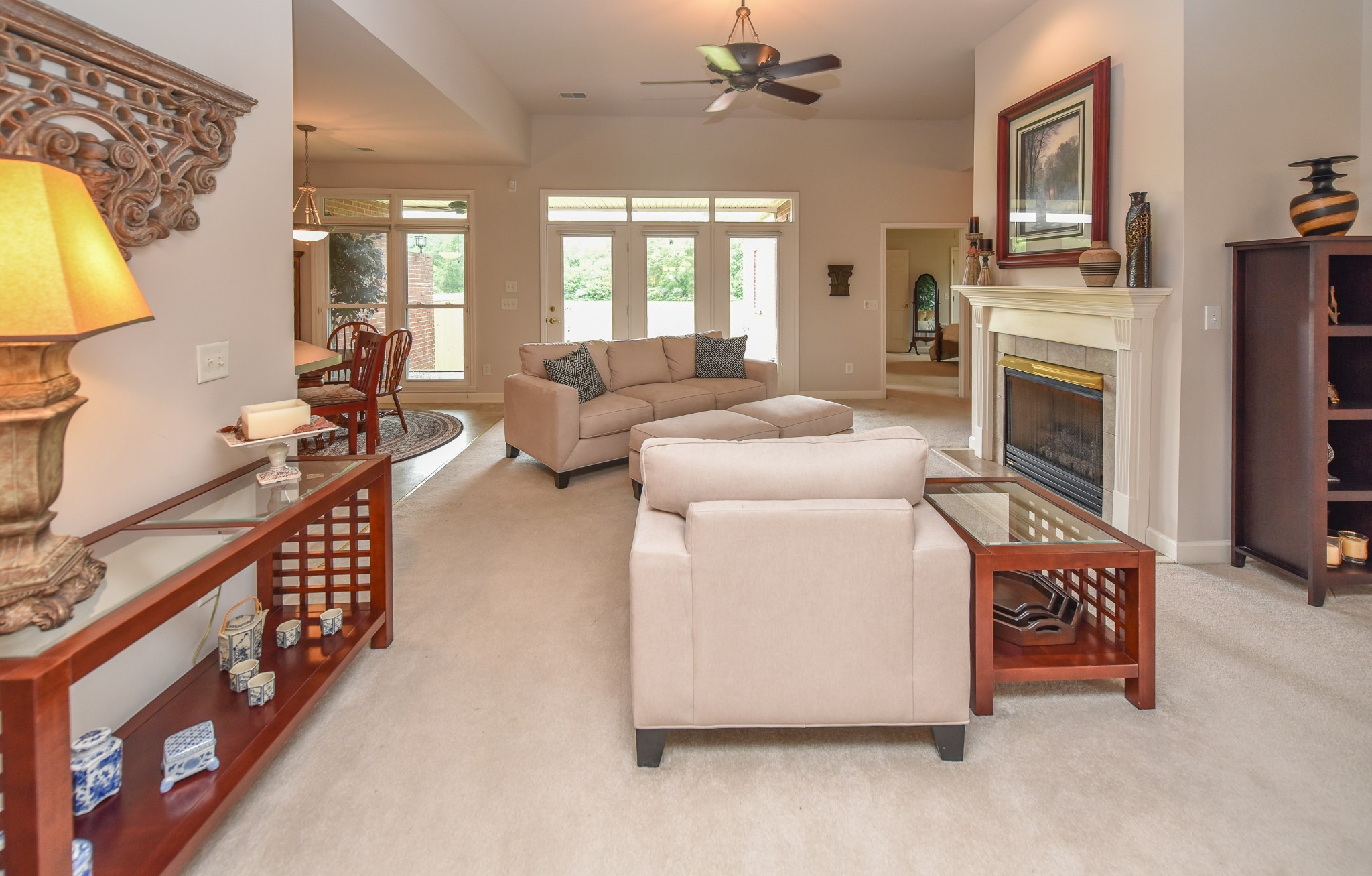 157 Stoners Glen Road Hermitage, TN 37076 - Photo 11 of 24 a living room with furniture a fireplace and a flat screen tv