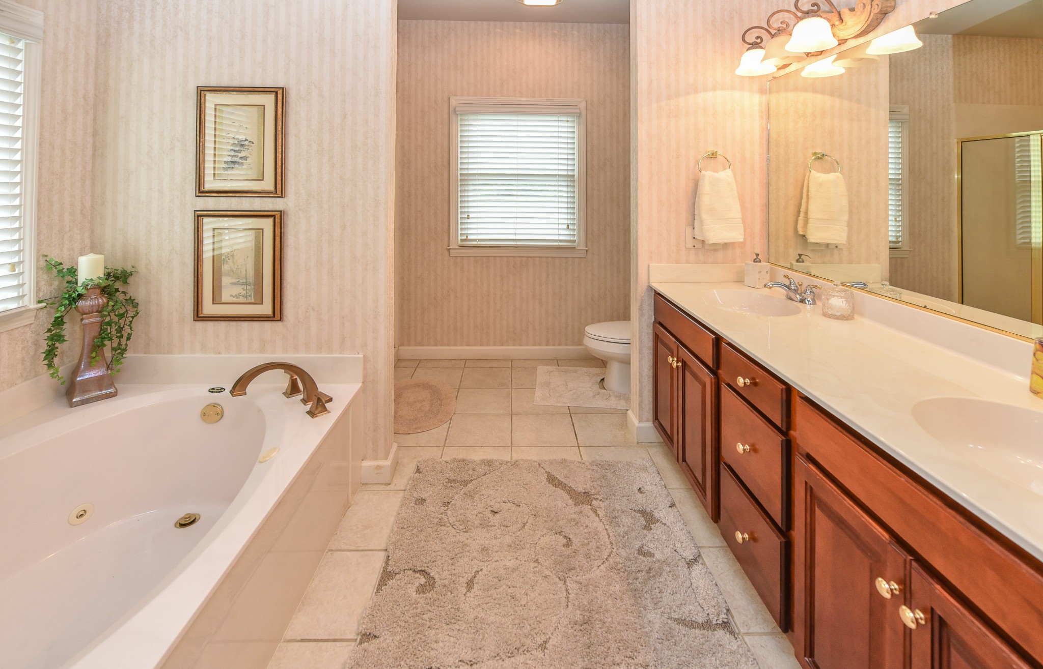 157 Stoners Glen Road Hermitage, TN 37076 - Photo 17 of 24 a spacious bathroom with a tub sink and mirror
