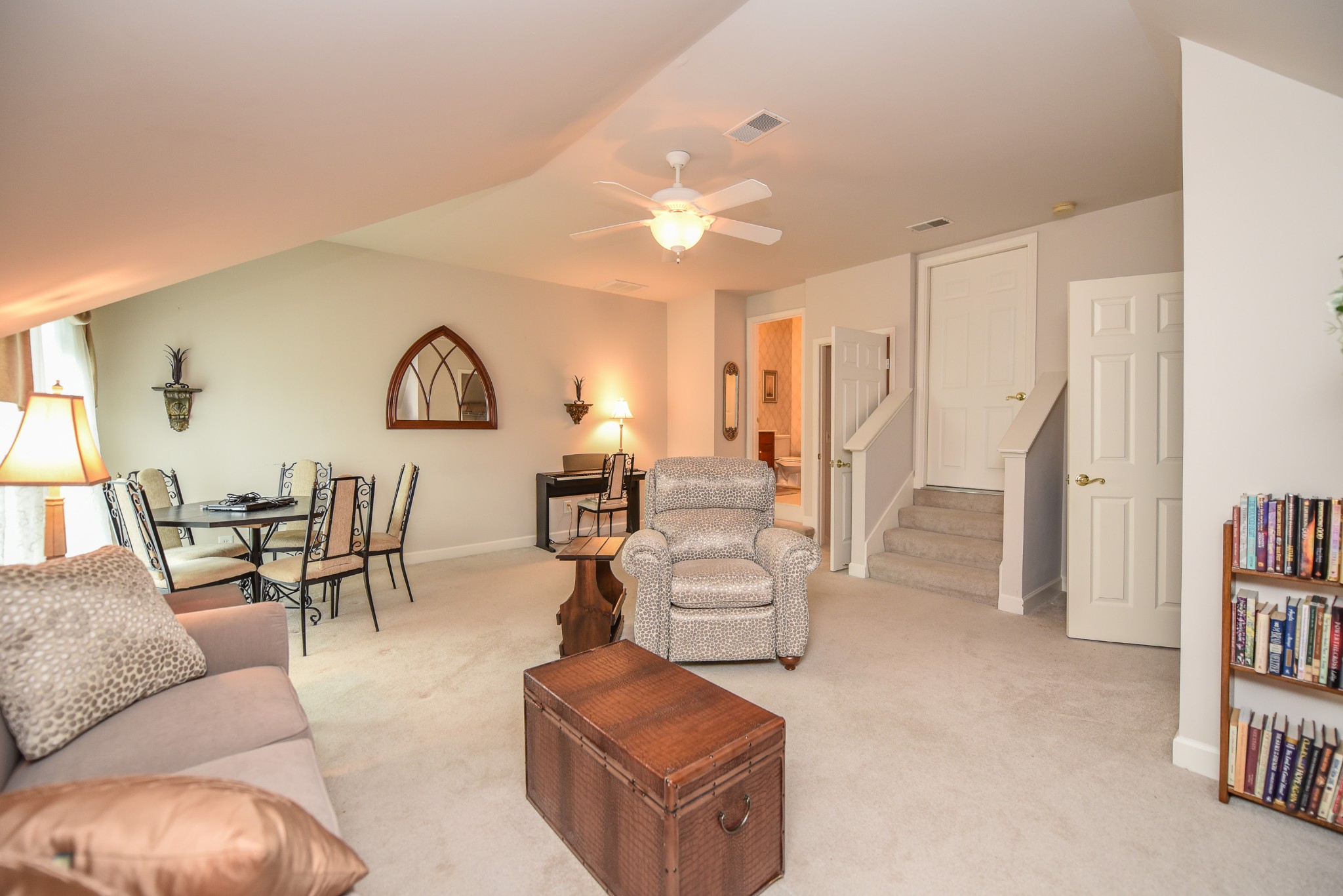 157 Stoners Glen Road Hermitage, TN 37076 - Photo 22 of 24 a living room with furniture and a book shelf