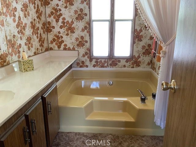 121 Larch Court Bodfish, CA 93205 - Photo 18 of 27 a bathroom with a bathtub