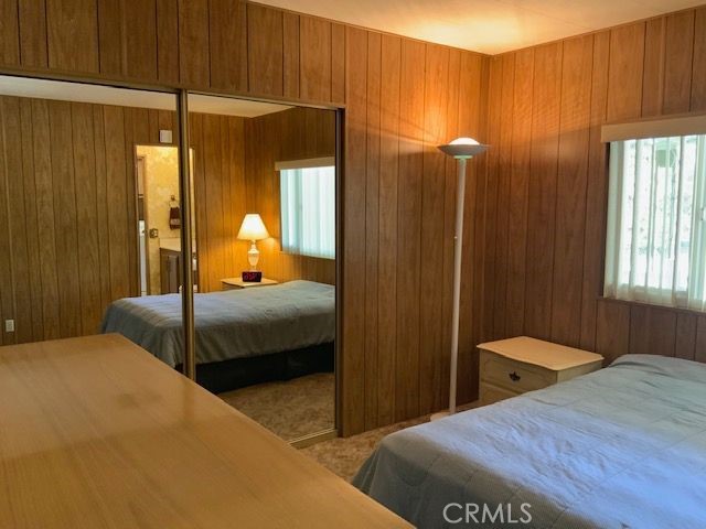121 Larch Court Bodfish, CA 93205 - Photo 19 of 27 a bedroom with a bed and a cabinets
