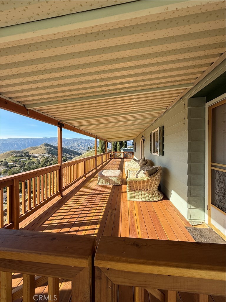 121 Larch Court Bodfish, CA 93205 - Photo 22 of 27 a view of a patio with wooden floor