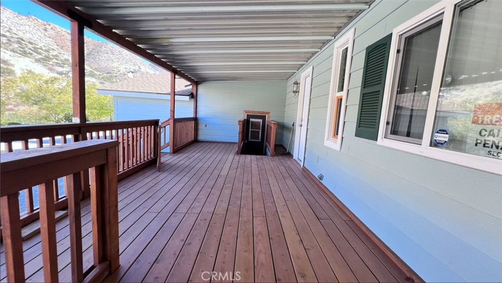 121 Larch Court Bodfish, CA 93205 - Photo 4 of 27 a view of a porch with wooden floor