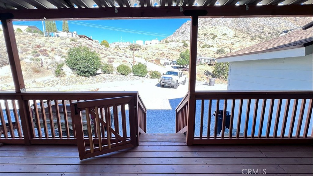 121 Larch Court Bodfish, CA 93205 - Photo 5 of 27 a view of a porch with wooden floor and outdoor space