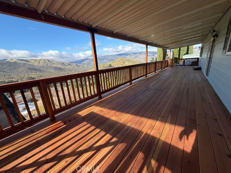 121 Larch Court Bodfish, CA 93205 - Photo 6 of 27 a view of balcony with wooden floor
