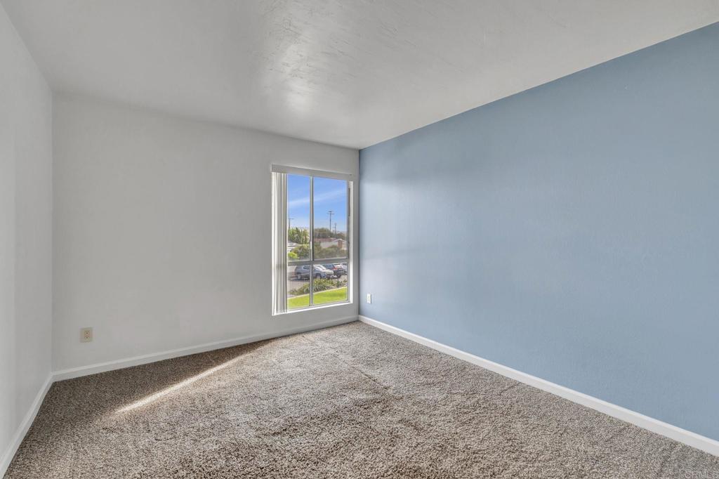 3571 Ruffin Road, Unit 239 San Diego, CA 92123 - Photo 16 of 33 a view of an empty room with a window