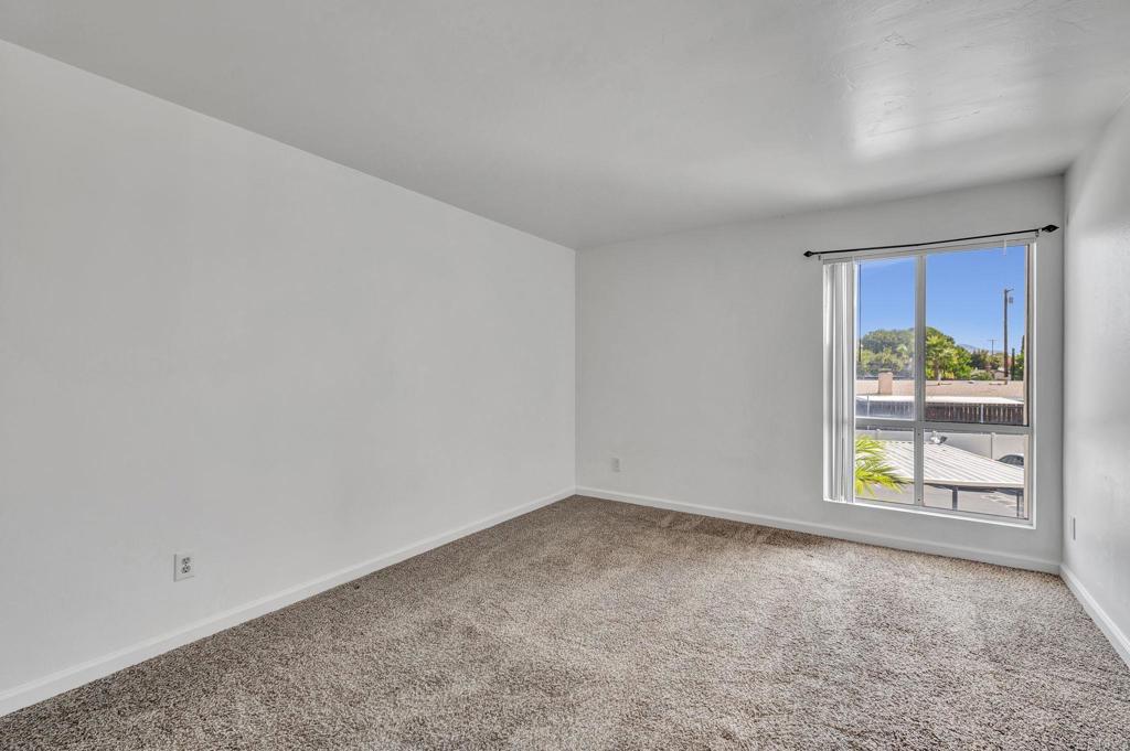 3571 Ruffin Road, Unit 239 San Diego, CA 92123 - Photo 21 of 33 a view of an empty room and a window