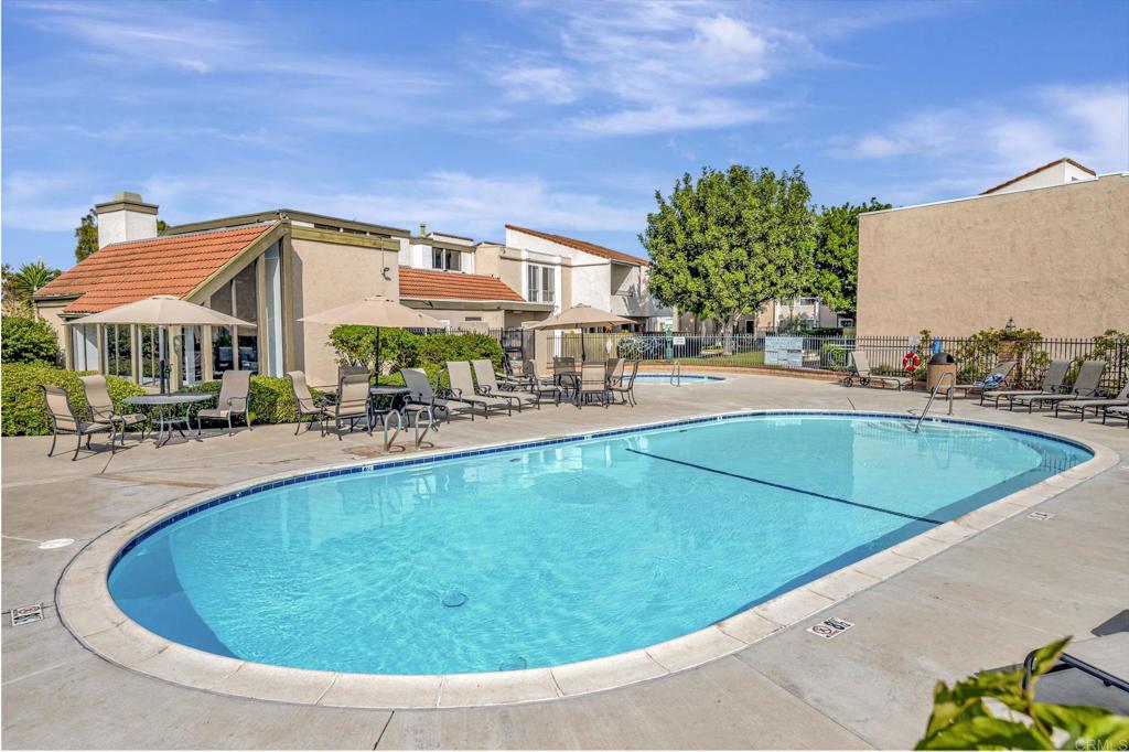 3571 Ruffin Road, Unit 239 San Diego, CA 92123 - Photo 32 of 33 a swimming pool with outdoor seating and yard