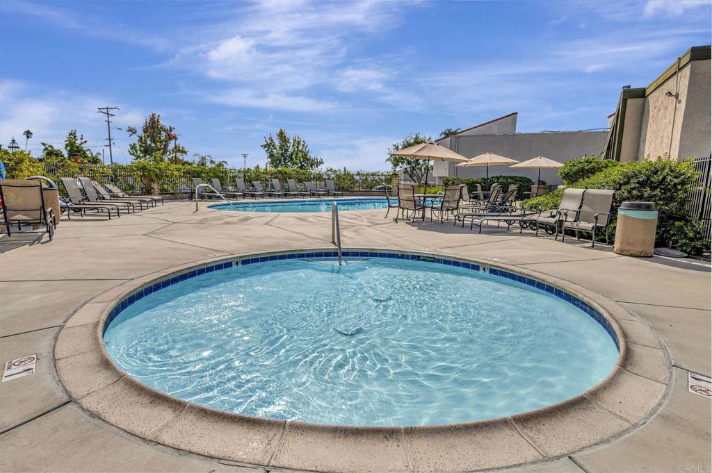 3571 Ruffin Road, Unit 239 San Diego, CA 92123 - Photo 33 of 33 a view of a swimming pool with a patio