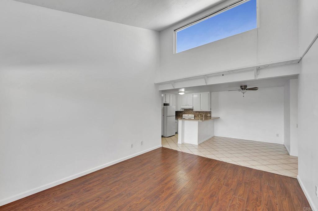 3571 Ruffin Road, Unit 239 San Diego, CA 92123 - Photo 7 of 33 a view of empty room with wooden floor