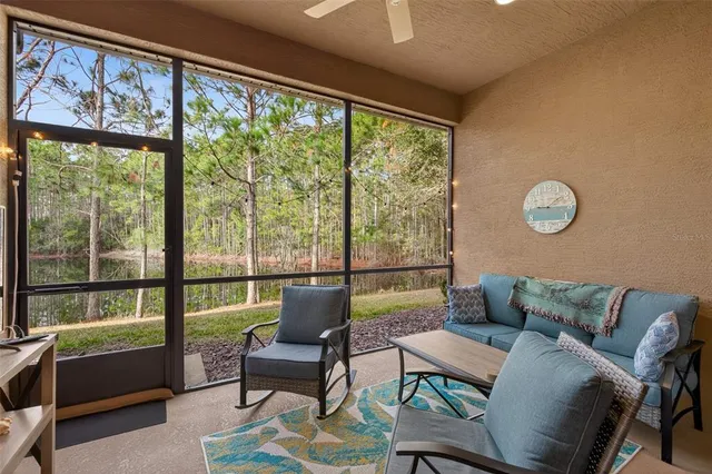 a bedroom with a bed and a table