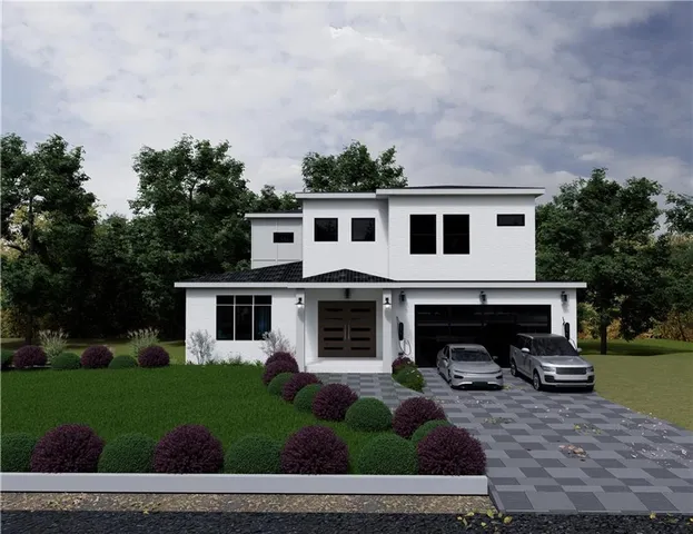 a house view with a garden space