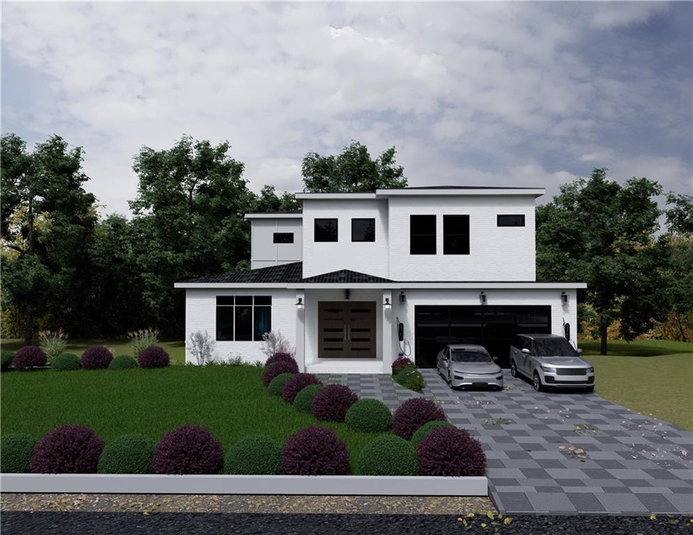 a house view with a garden space