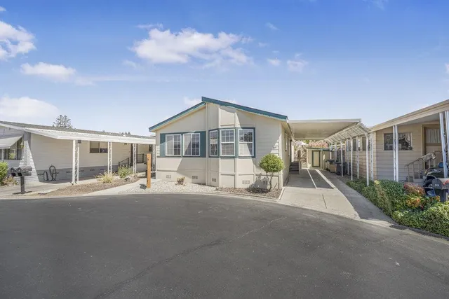 a very nice looking house with a large window
