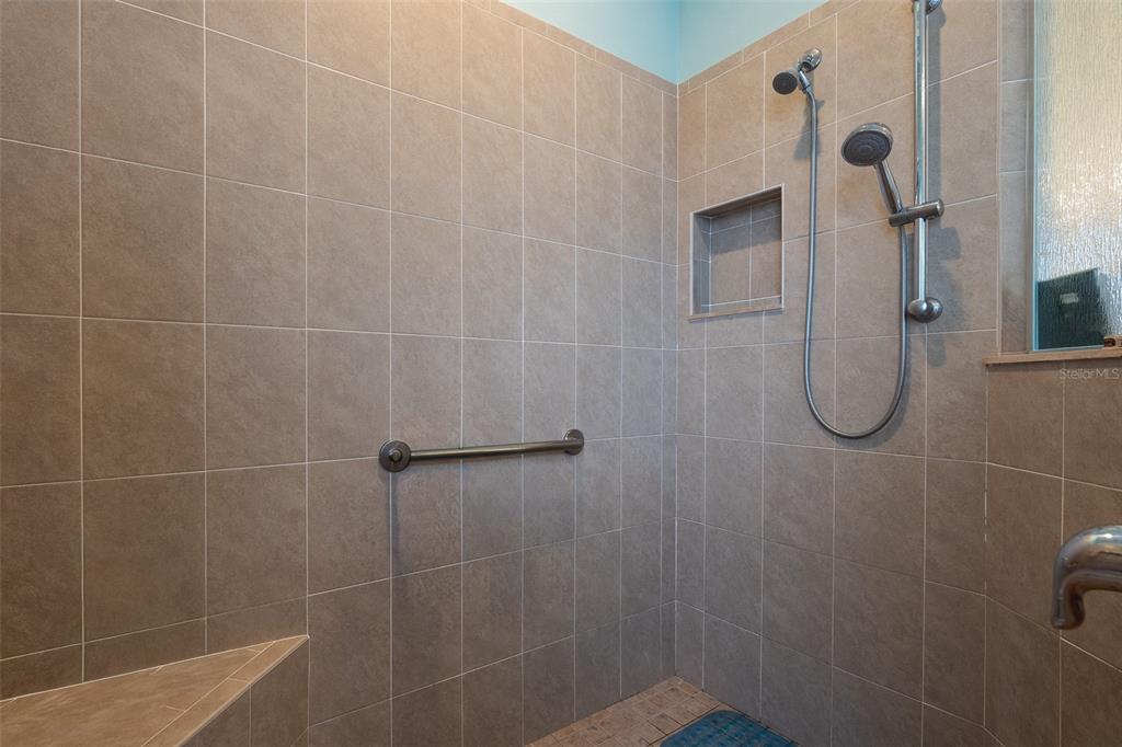 15969 Southwest 14th Avenue Road Ocala, FL 34473 - Photo 23 of 46 a bathroom with a shower