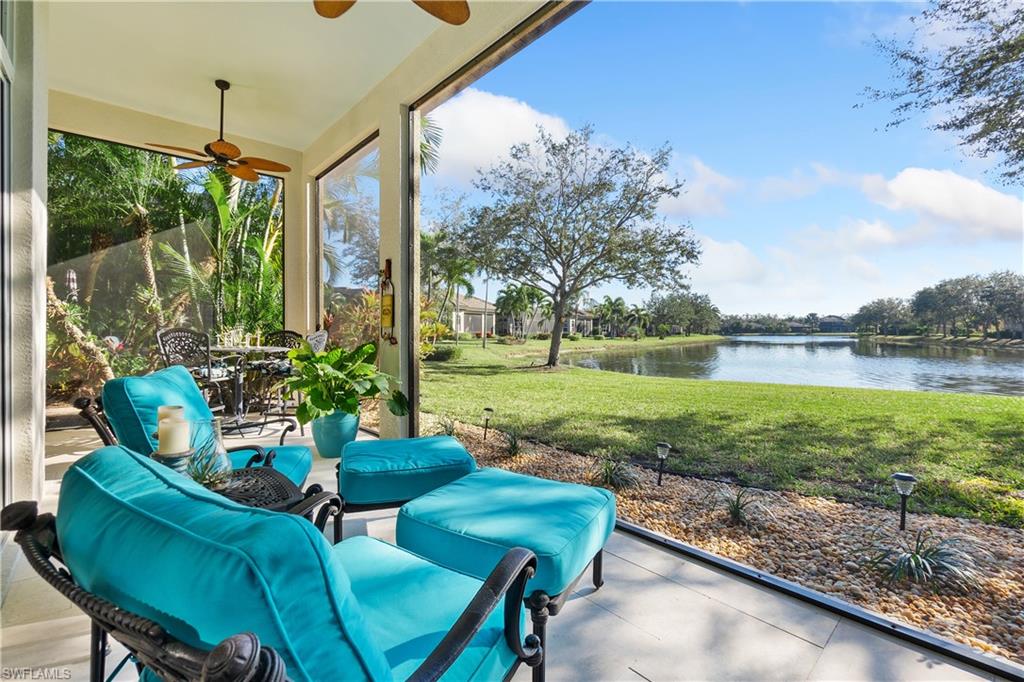 12612 Grandezza Circle Estero, FL 33928 - Photo 25 of 48 Unfurnished sunroom featuring a water view and ceiling fan