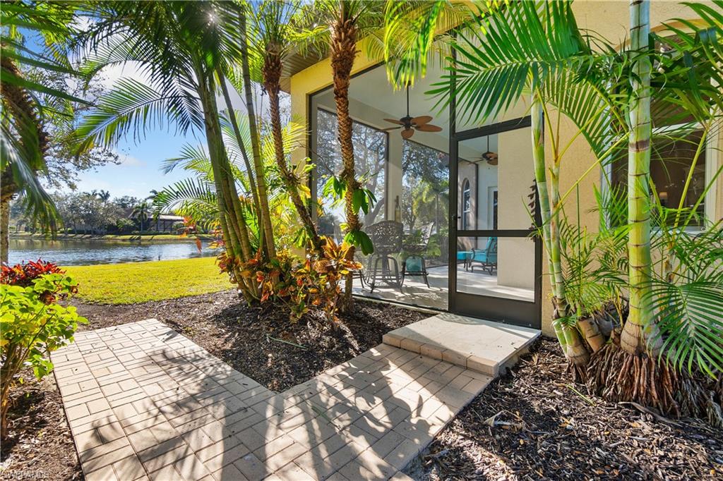 12612 Grandezza Circle Estero, FL 33928 - Photo 26 of 48 View of patio / terrace with a water view and ceiling fan
