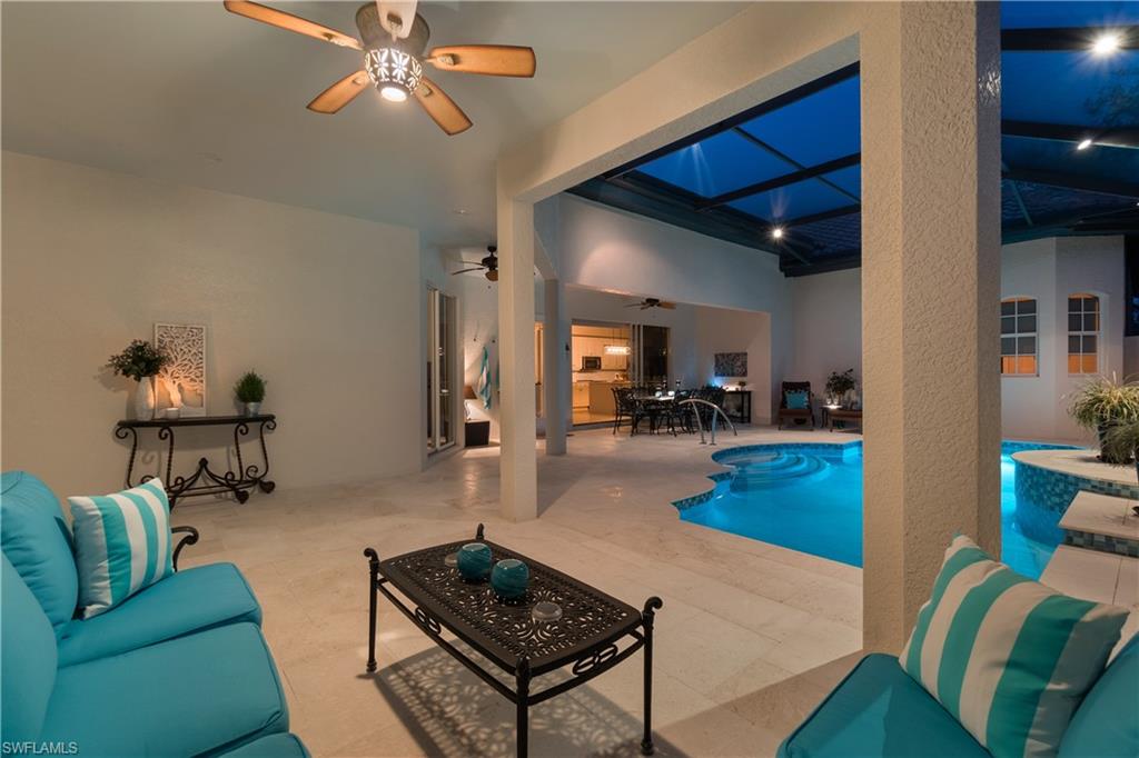 12612 Grandezza Circle Estero, FL 33928 - Photo 42 of 48 View of swimming pool featuring ceiling fan