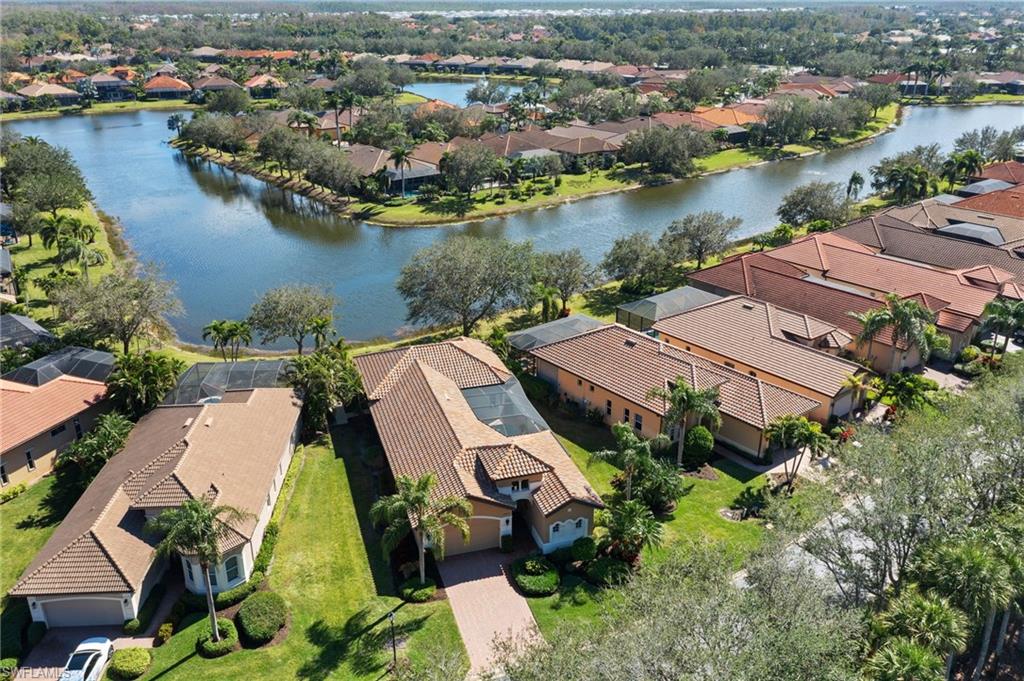 12612 Grandezza Circle Estero, FL 33928 - Photo 46 of 48 Drone / aerial view featuring a water view