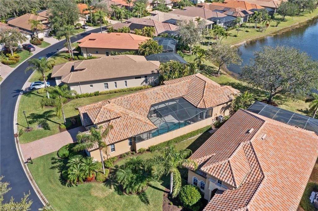 12612 Grandezza Circle Estero, FL 33928 - Photo 47 of 48 Bird's eye view with a water view