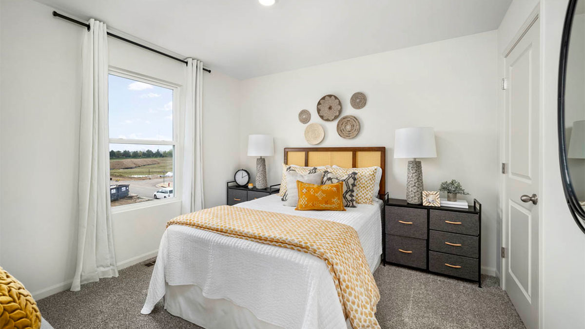 6530 Linden Trail, Unit B Wonder Lake, IL 60097 - Photo 11 of 13 a bedroom with a bed and a window