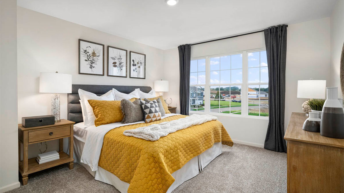 6530 Linden Trail, Unit B Wonder Lake, IL 60097 - Photo 13 of 13 a bedroom with a bed and a large window