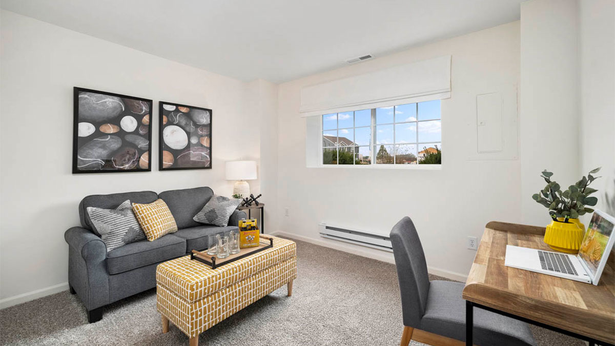 6530 Linden Trail, Unit B Wonder Lake, IL 60097 - Photo 8 of 13 a living room with furniture and a window