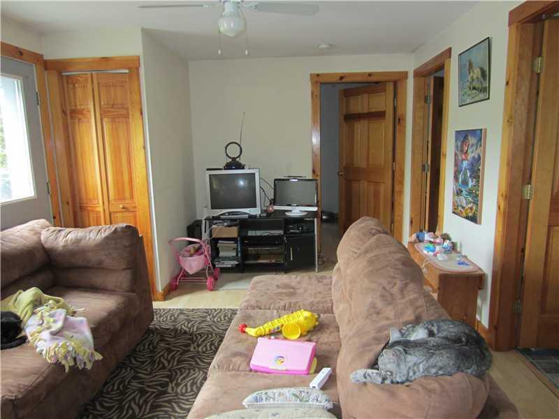 104 Protheroe Crossing Hudson, ME 04449 - Photo 17 of 28 Living Room.
