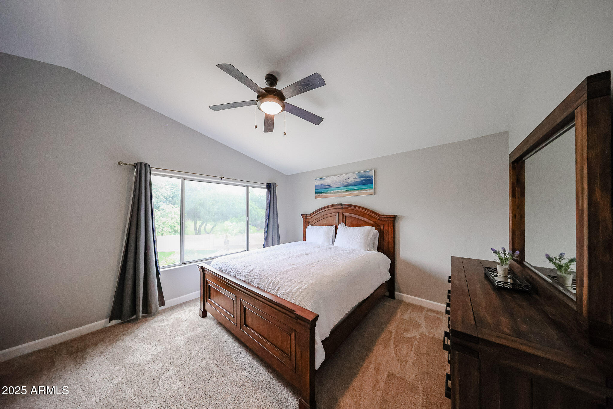 3902 East Rosemonte Drive Phoenix, AZ 85050 - Photo 20 of 46 a bed room with a bed window and a flat tv screen