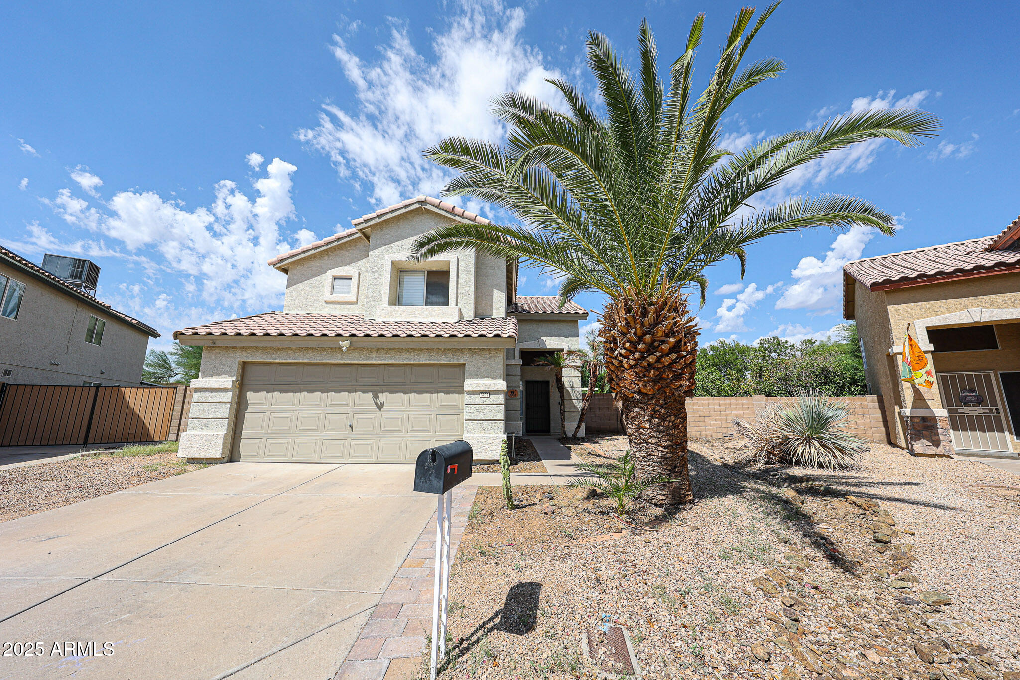 3902 East Rosemonte Drive Phoenix, AZ 85050 - Photo 2 of 46 a front view of a house with a yard