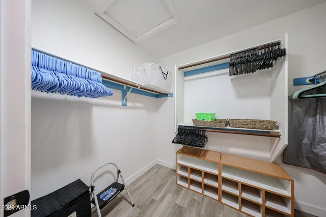 a view of a livingroom with furniture and a window