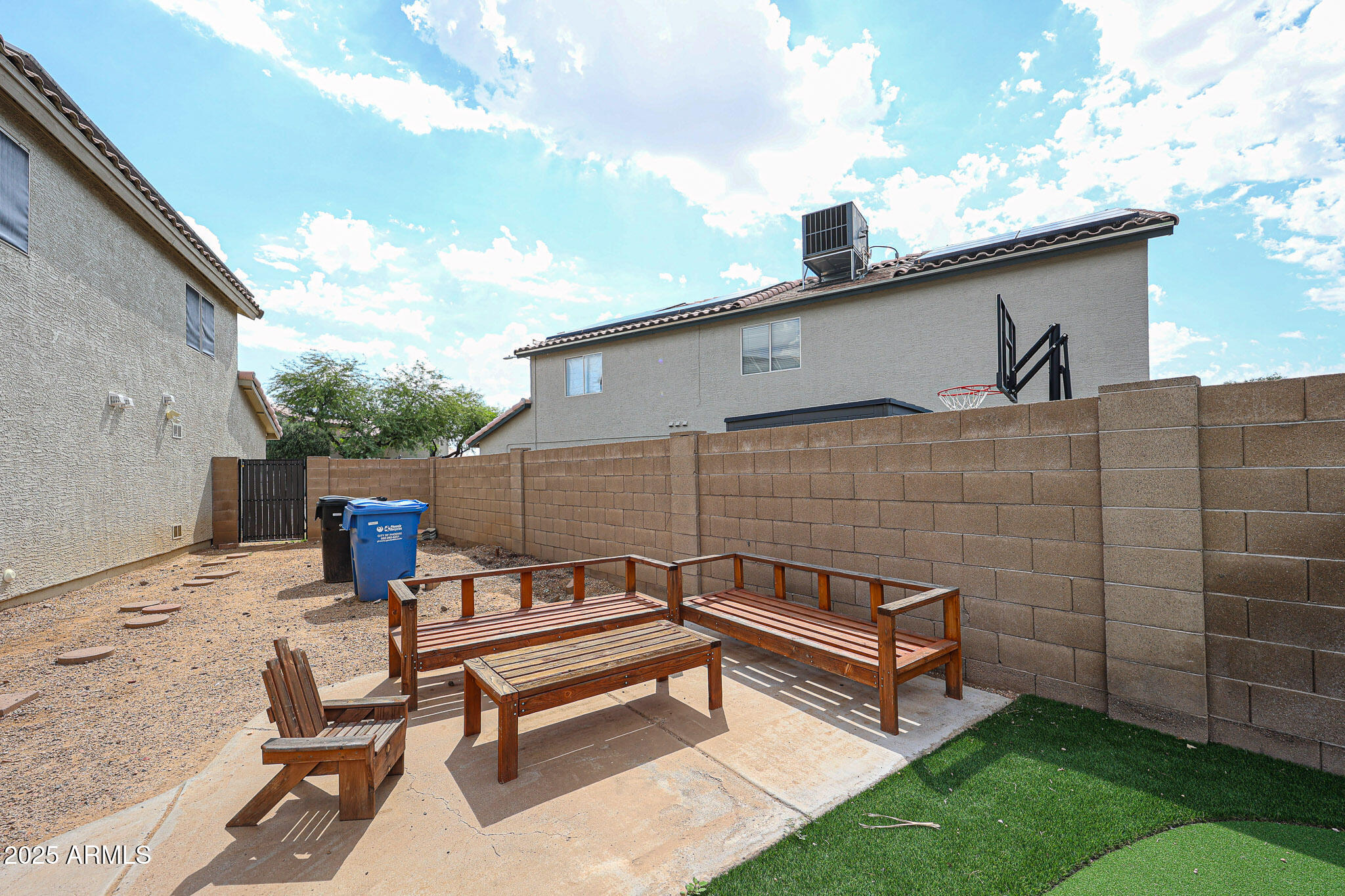 3902 East Rosemonte Drive Phoenix, AZ 85050 - Photo 33 of 46 a view of a bench in the patio