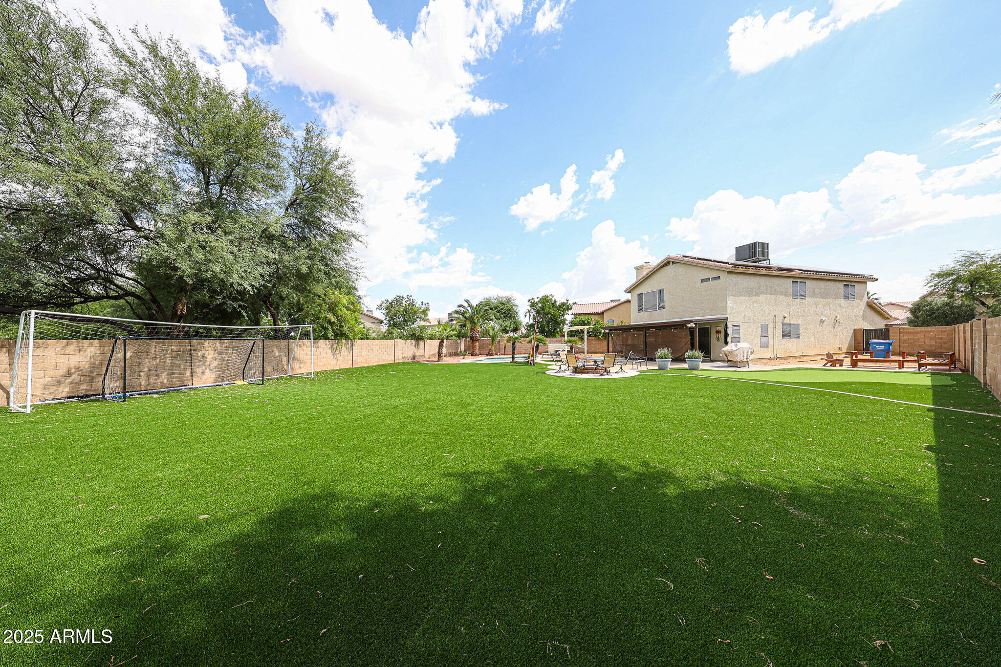 3902 East Rosemonte Drive Phoenix, AZ 85050 - Photo 35 of 46 a front view of a house with garden
