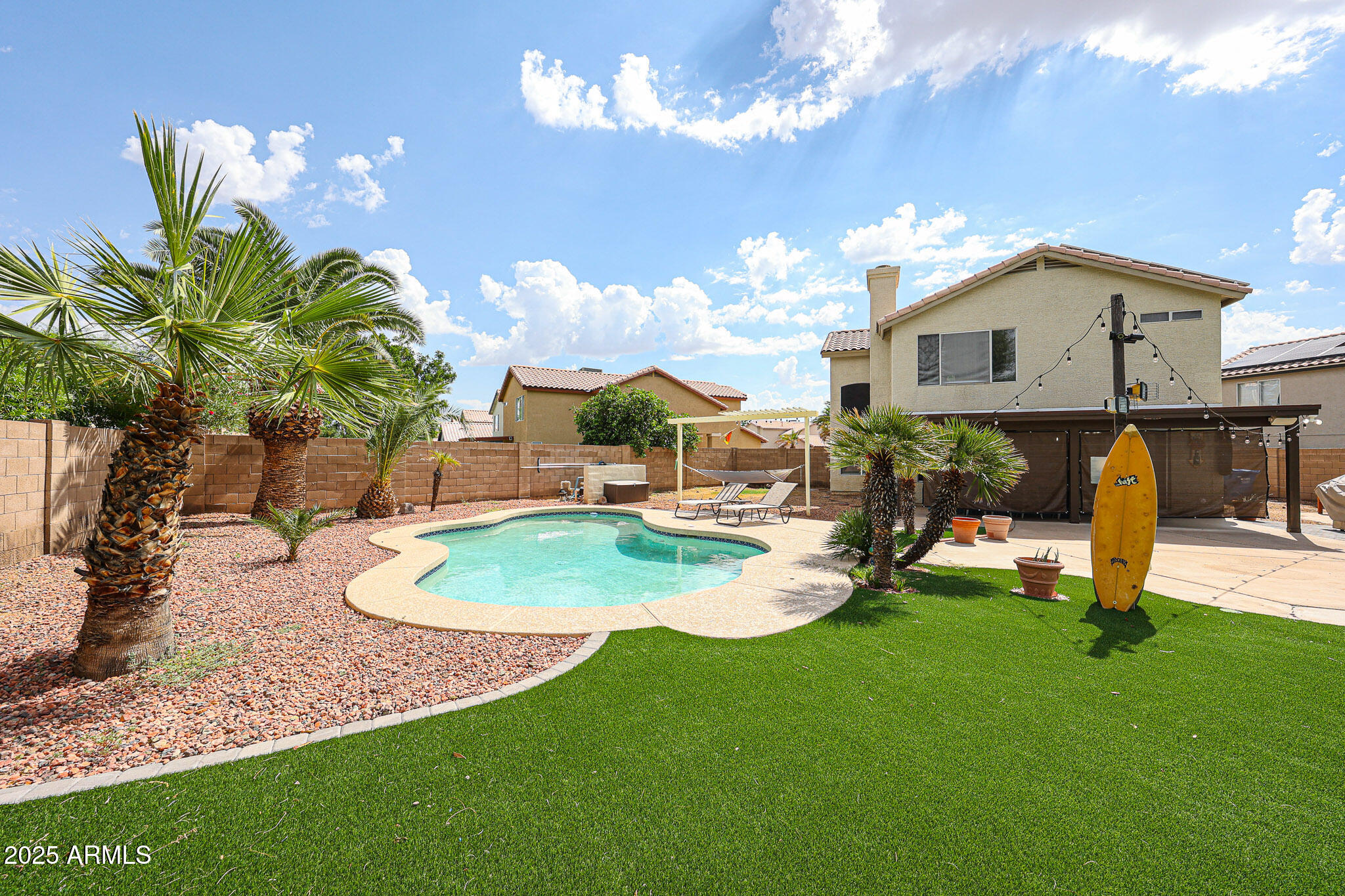 3902 East Rosemonte Drive Phoenix, AZ 85050 - Photo 37 of 46 a view of a backyard with swimming pool