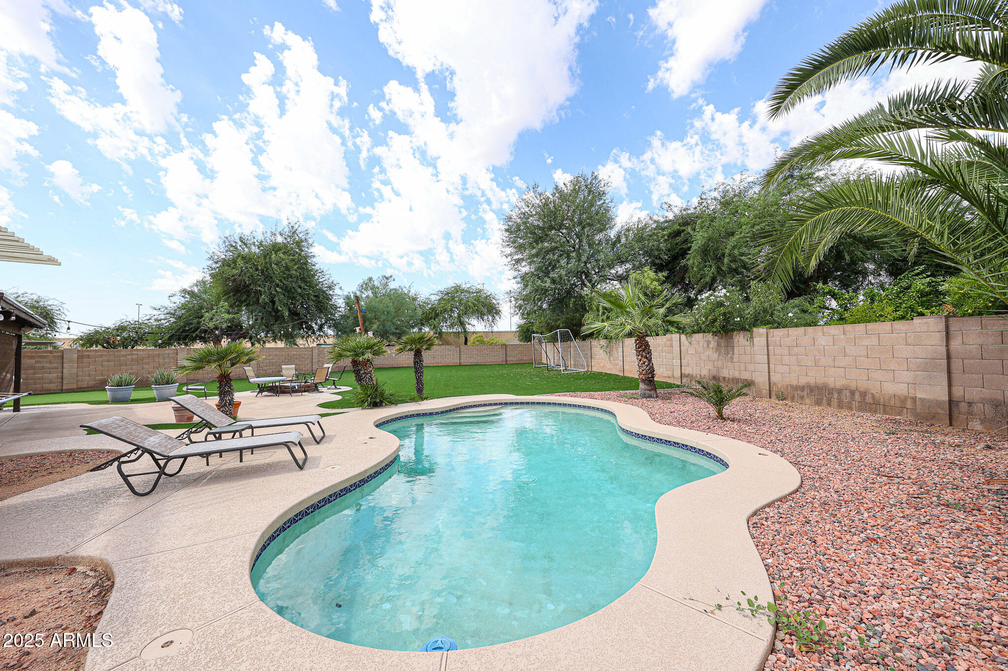 3902 East Rosemonte Drive Phoenix, AZ 85050 - Photo 41 of 46 a view of a swimming pool with a patio