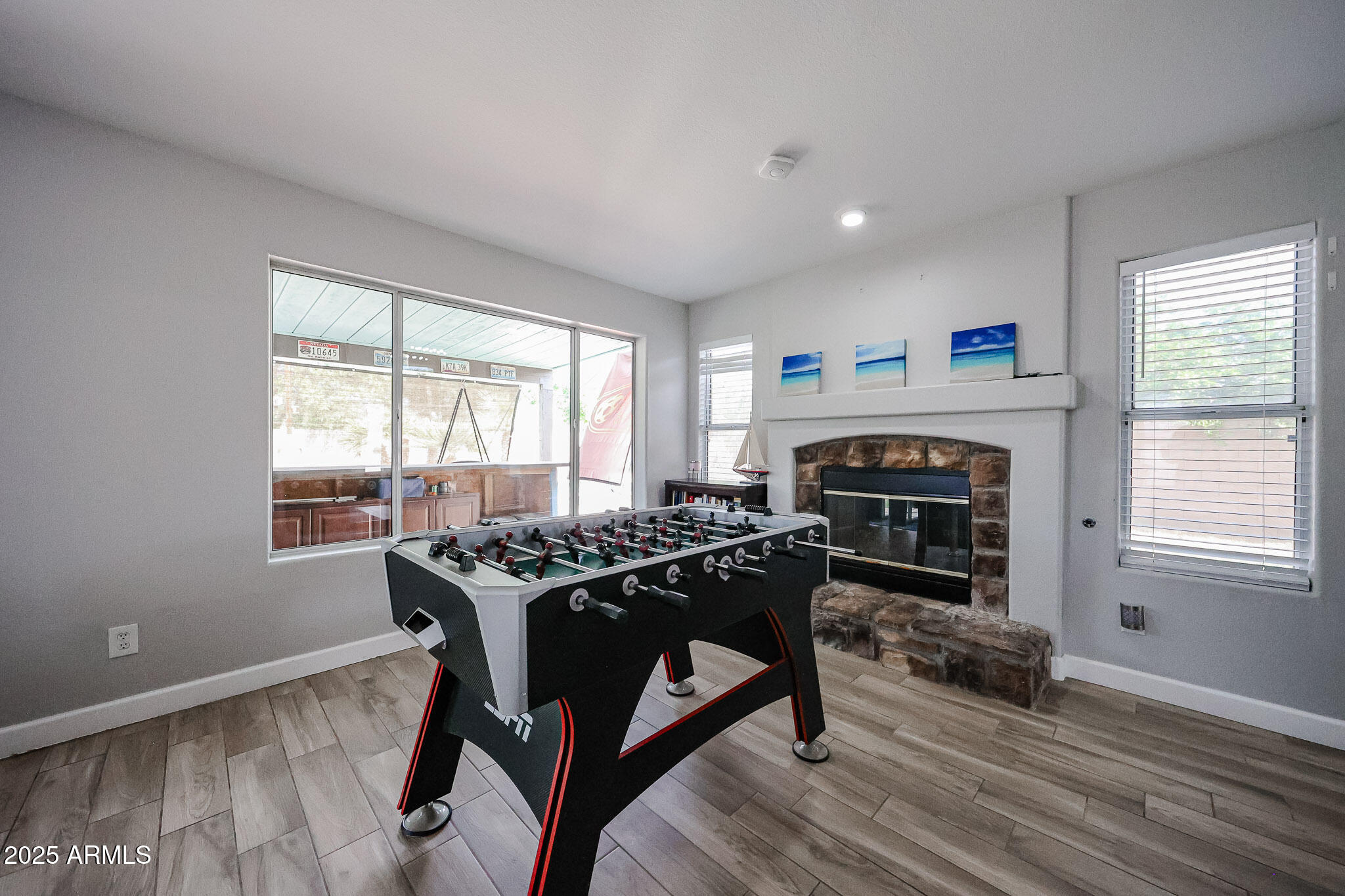 3902 East Rosemonte Drive Phoenix, AZ 85050 - Photo 9 of 46 a livingroom with furniture window and wooden floor