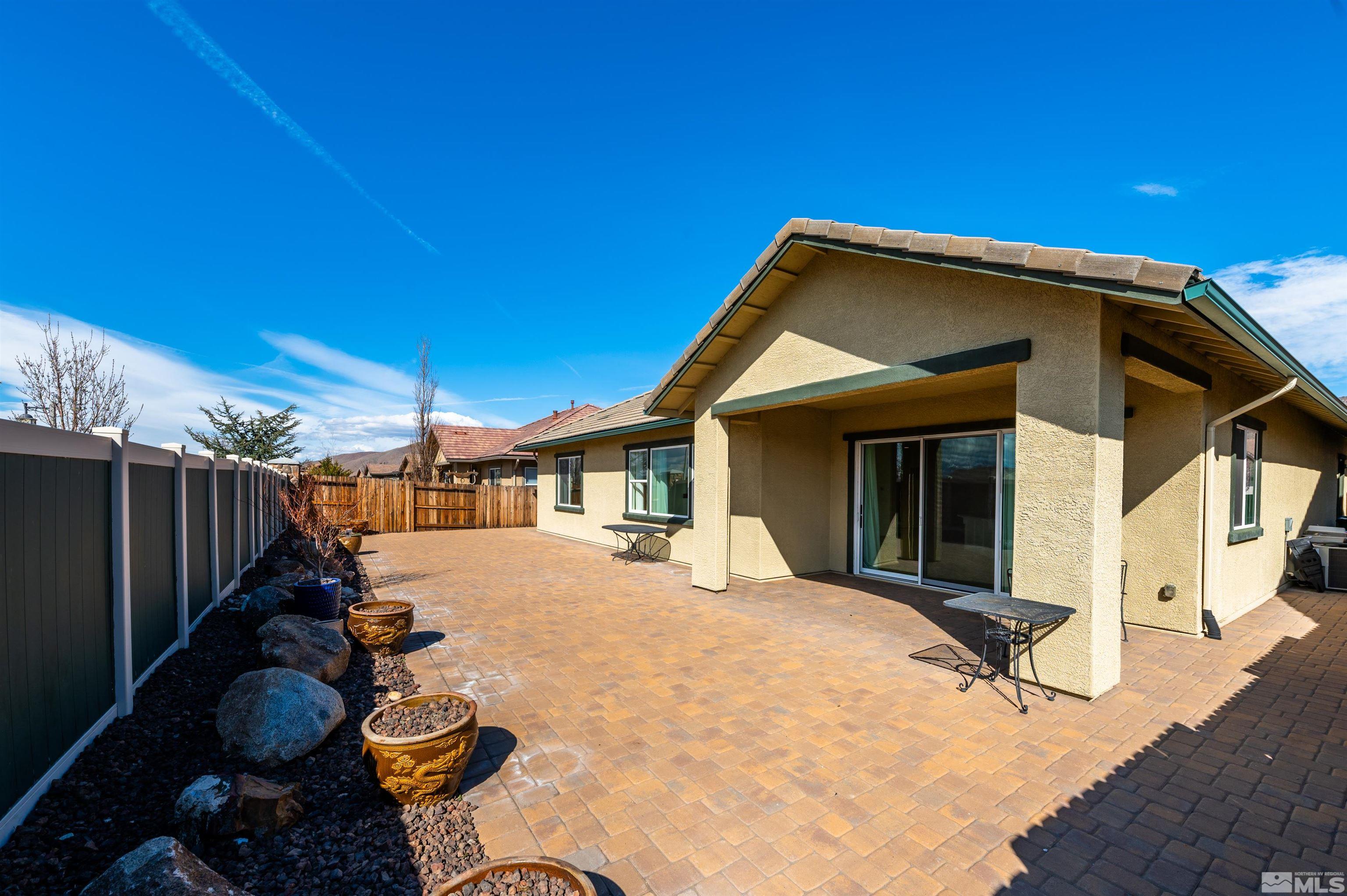 10065 Ellis Park Lane Reno, NV 89521 - Photo 26 of 30 a view of a house and outdoor space