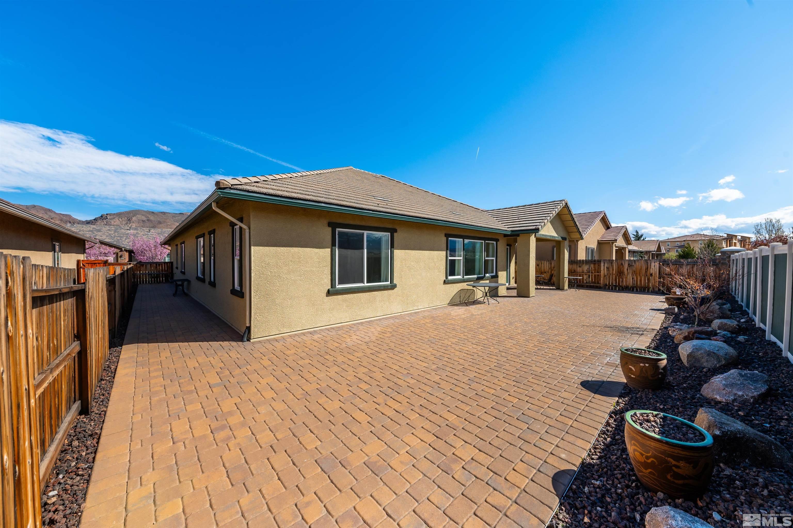10065 Ellis Park Lane Reno, NV 89521 - Photo 27 of 30 a house view with a outdoor space