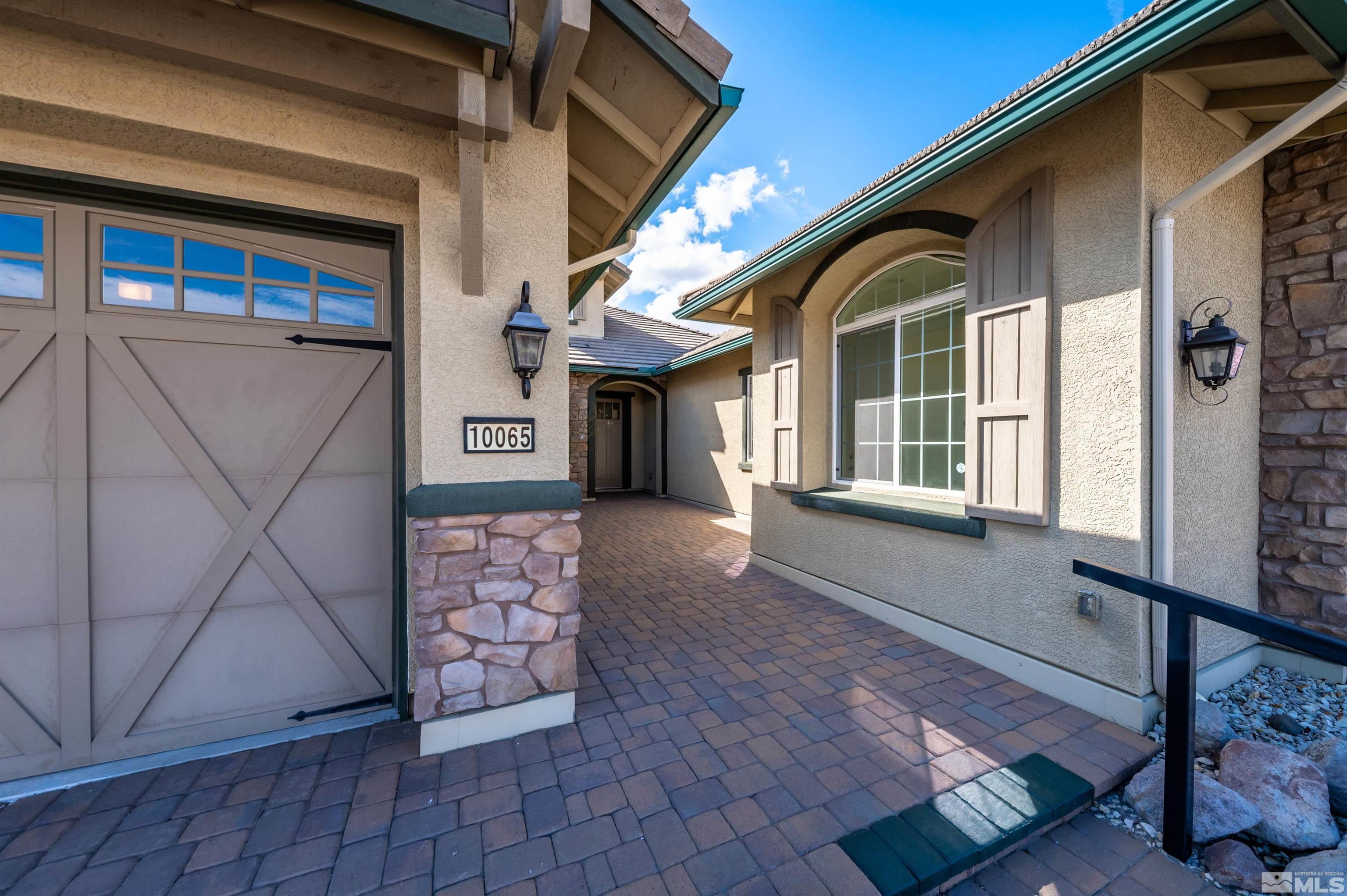 10065 Ellis Park Lane Reno, NV 89521 - Photo 3 of 30 a front view of a house
