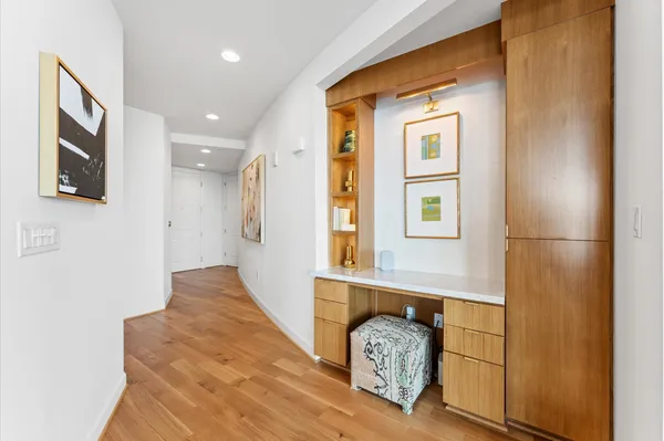 a view of a hallway with windows