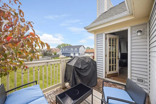 a view of a chairs and table in the terrace
