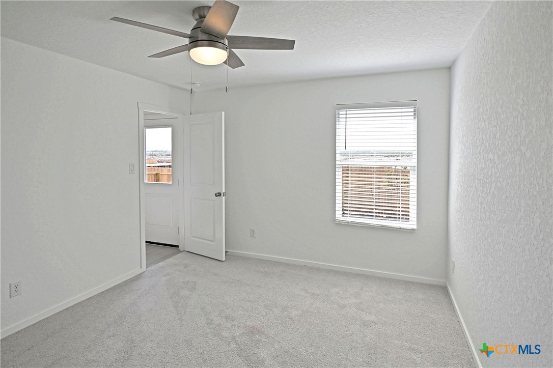 11560 Chestnut Rose St. Hedwig, TX 78152 - Photo 19 of 28 a view of an empty room with a window