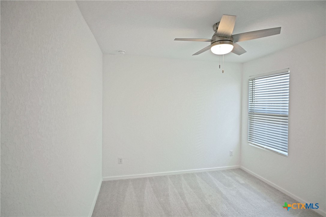 11560 Chestnut Rose St. Hedwig, TX 78152 - Photo 4 of 28 an empty room with a window