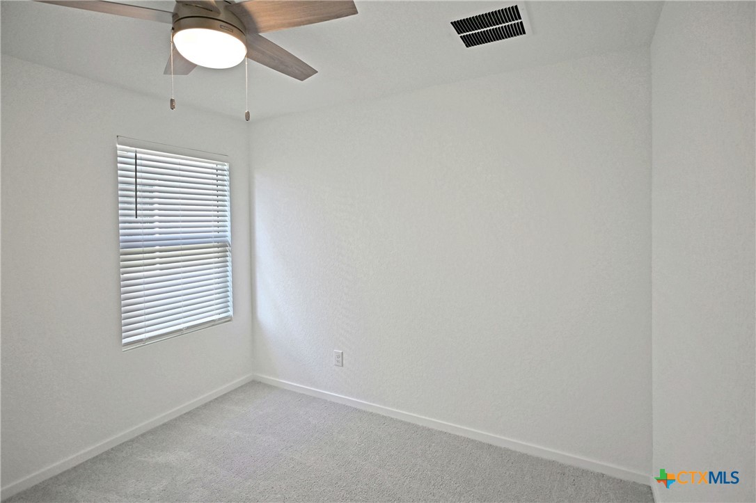 11560 Chestnut Rose St. Hedwig, TX 78152 - Photo 9 of 28 an empty room with a window