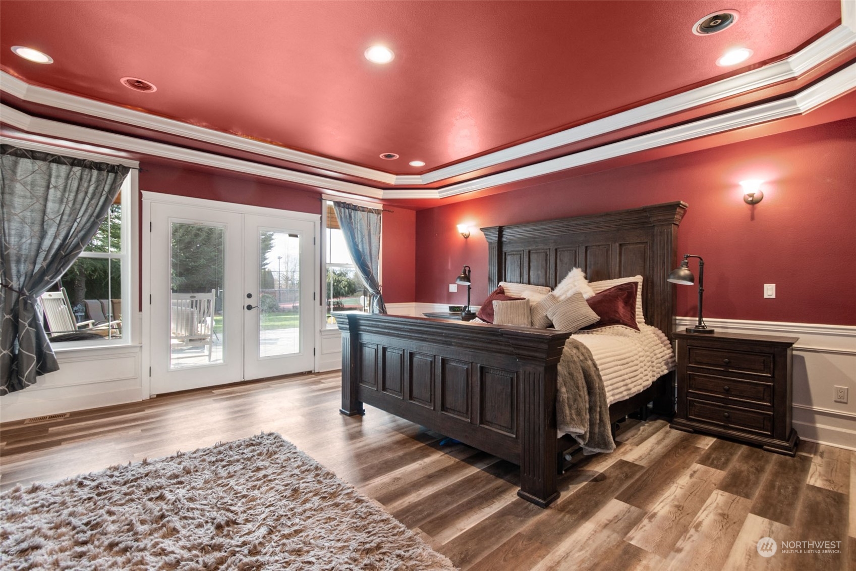 6504 263rd Street East Graham, WA 98338 - Photo 12 of 38 a bedroom with furniture and window