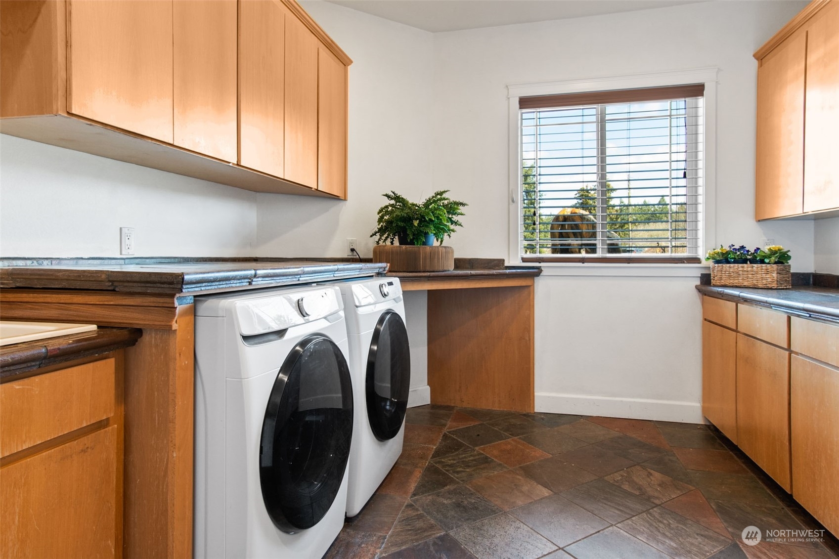 6504 263rd Street East Graham, WA 98338 - Photo 20 of 38 a utility room with sink dryer and washer