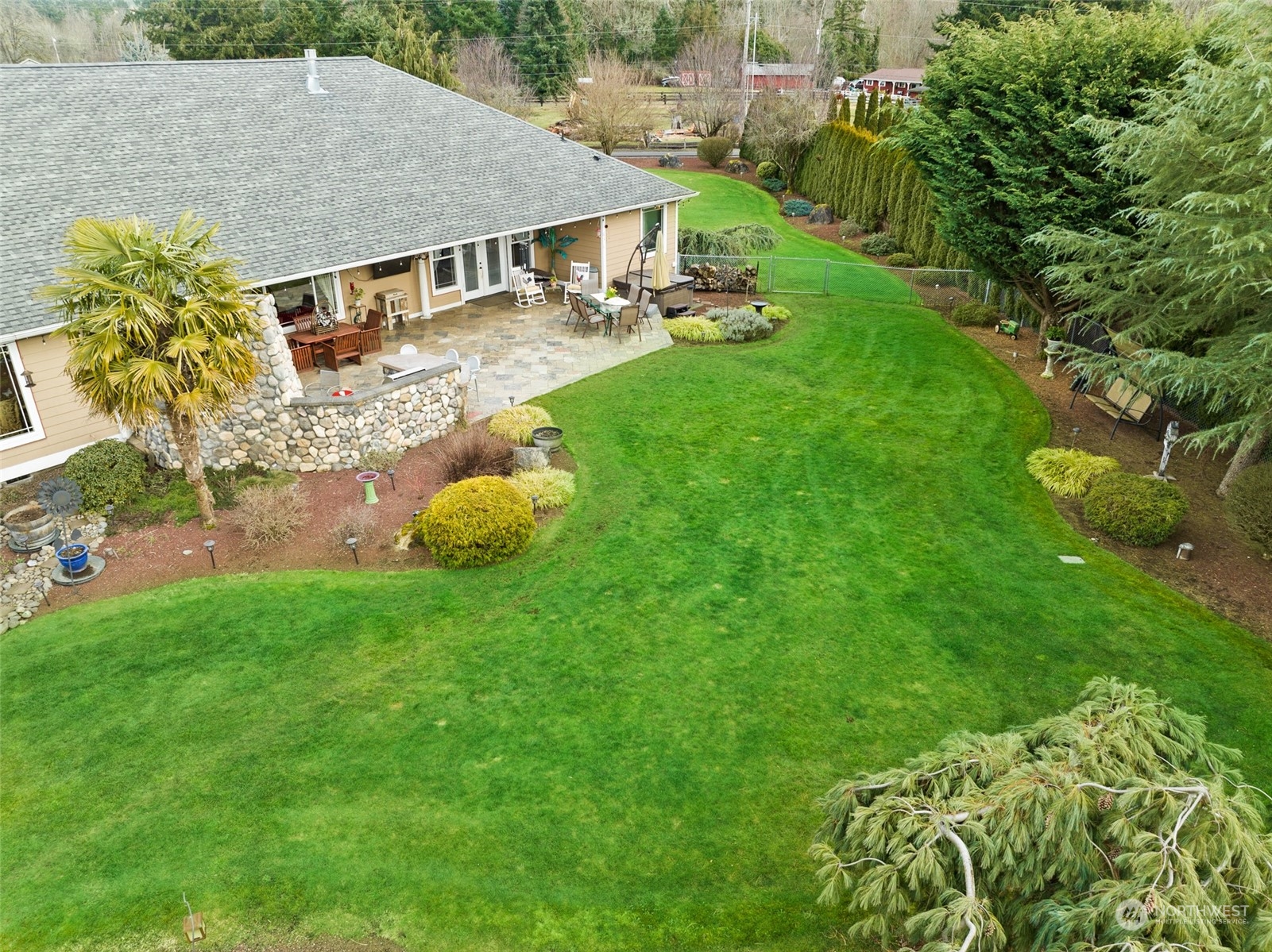 6504 263rd Street East Graham, WA 98338 - Photo 25 of 38 an aerial view of a house having yard