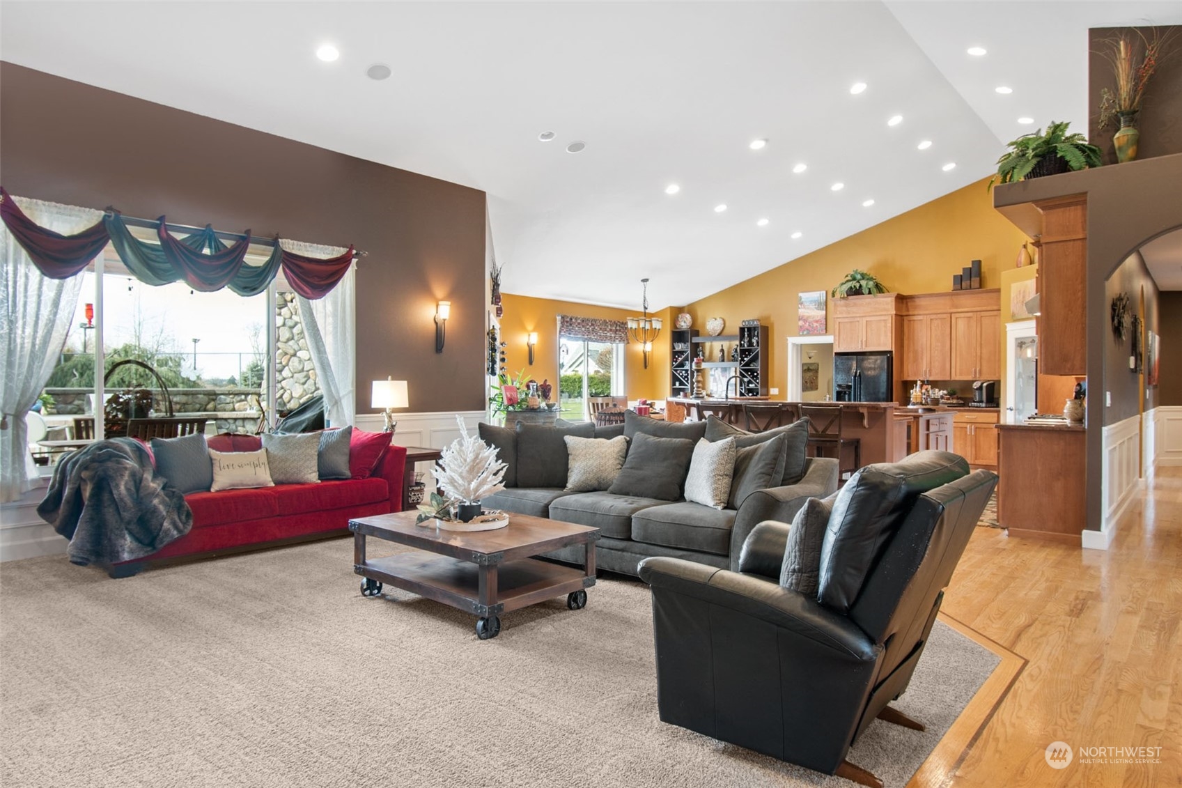 6504 263rd Street East Graham, WA 98338 - Photo 6 of 38 a living room with furniture and a large window