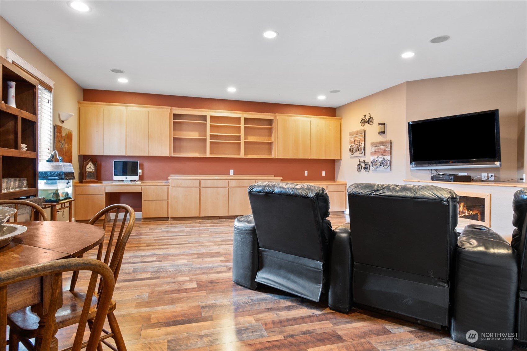 6504 263rd Street East Graham, WA 98338 - Photo 10 of 38 a living room with furniture and a flat screen tv